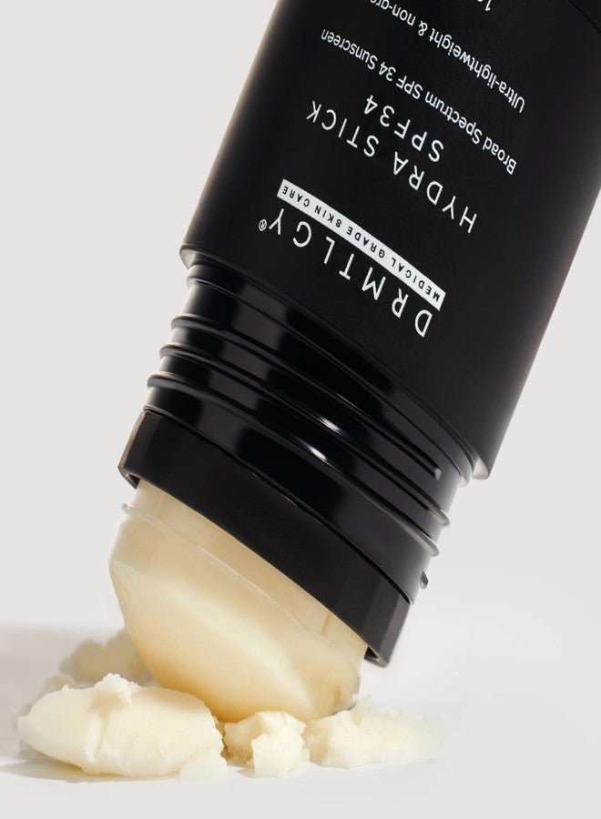 درمتلجي عصا واقي الشمس DRMTLGY بعامل حماية SPF 34 - عصا مرطبة معدنية غير مرئية وخالية من الفوضى للوجه والجسم مع السكوالين والصبار وزيت جوز الهند - واقي شمس واسع الطيف مقاوم للماء لجميع أنواع البشرة - Image 2